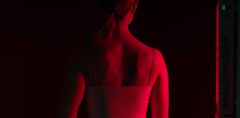 Woman,Getting,Red,Light,Therapy,On,Her,Back